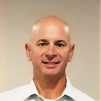 A headshot photo of Dr. Christopher Brown